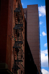 Old fire escape on an old brick wall. American vintage style.