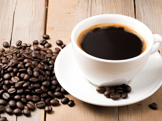 Fototapeta premium Close-up coffee cup on a wooden table