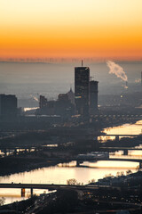 Naklejka premium Left bank of the Danube river in the capital city of Austria, Vienna just before sunrise