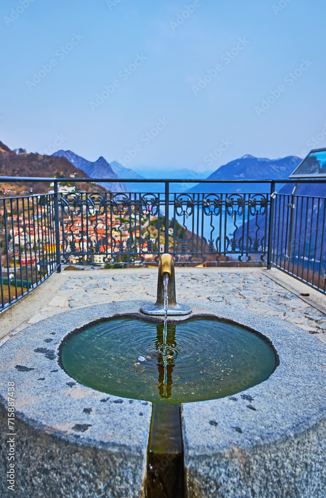 Canvas Prints The drinking fountain on Monte Bre viewing terrace, Switzerland