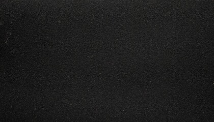 black sandpaper texture background close up