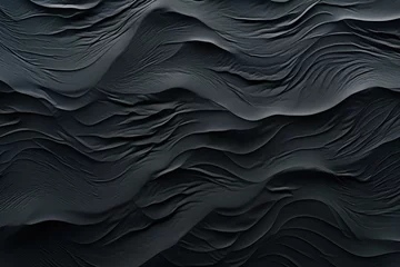 Foto op Aluminium  a close up of a black surface with wavy, wavy, wavy, wavy, wavy patterns on the surface. © Shanti