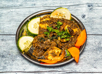 coriander prawn roast served in dish isolated on wooden table top view of indian spicy food