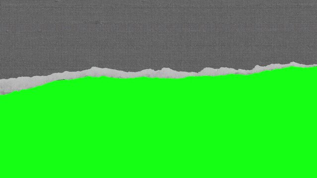 Ripped sheet of paper from right to left on green screen. Empty space. Copy space. Paper transition. 