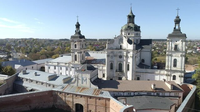 Aerial drone dolly footage of Monastery of the Bare Carmelites in Berdychiv, historic city in Zhytomyr Oblast, Ukraine.