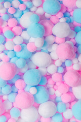 White, pink and blue soft pompons
