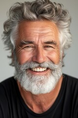 Obraz premium Closeup photo portrait of a handsome old mature man smiling with clean teeth