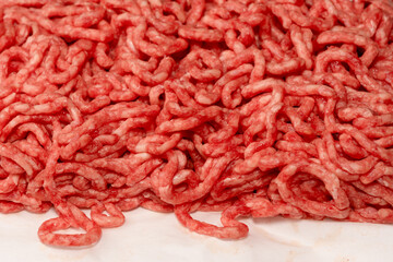 Raw minced beef close-up, top view.