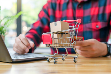 Man or customer add products to card while online store shopping. e-commerce marketing supplier