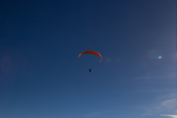 paragliding in the blue sky
