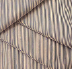 Obraz premium Beige canvas texture. Colorful paper background with empty copy space. Minimalist textile wallpaper. Beautiful backdrop for presentation or product.