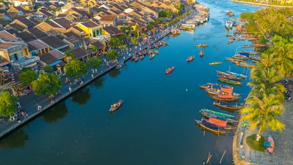 Foto op Canvas Aerial drone view of Hoi An city during a sunset in Vietnam. Ancient town, UNESCO world heritage, at Quang Nam province.  © Audrius