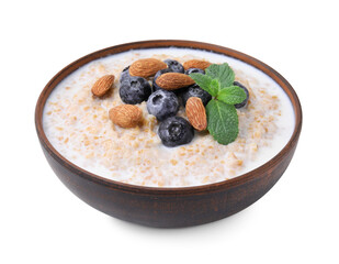 Tasty wheat porridge with milk, blueberries and almonds in bowl isolated on white