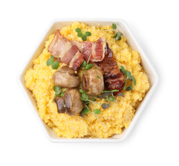 Cooked cornmeal with bacon, mushrooms and microgreens in bowl isolated on white, top view
