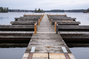 Docks at a marina looking out at the water on an cloudy fall day