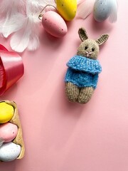 Happy Easter Concept. Easter eggs on pastel pink background. Postcard. Simple minimalism flat layer top view copy space