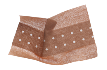 Crumpled adhesive bandage new, sticky isolated on white, top view 