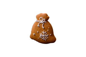 Beautiful delicious sweet winter Christmas gingerbread cookies on a bronze textured background