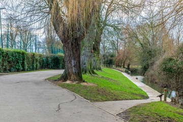 A view down the main path in Welland Park in the town of Market Harborough in Winter