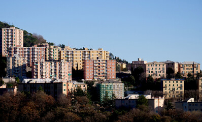 Fototapeta na wymiar Houses in a hilly neighborhood in Italy