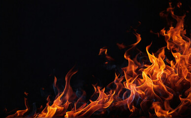 Obraz premium fire in the dark, Fire flames on black background, Light and shadow smoke abstract copy space background. Framed Vignette. texture for banners graphics, design and decoration