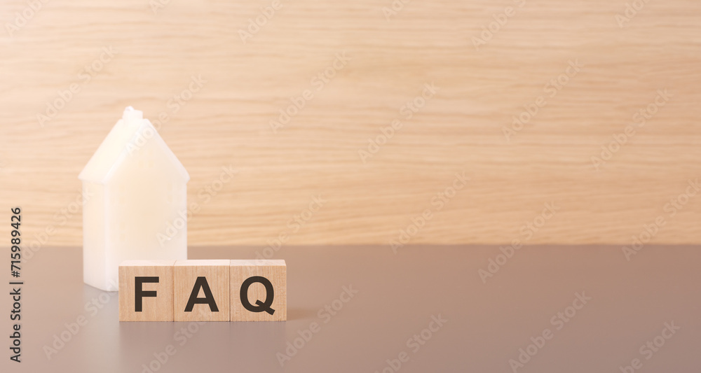 Poster cubes form the word npl. on a light background there is a row of cubes and a toy house in the backgr
