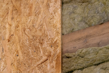 Screwing OSB Plate, Enhancing with Mineral Wool.