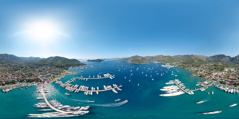 360 degree panoramic view of the marina and the city of Gocek, Turkey. Busy harbor with many...
