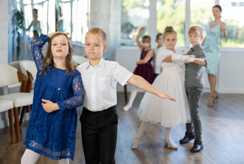 Classical dances performed by preteen children in beautiful festive clothes