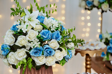 wooden table decorated with sweets and flowers