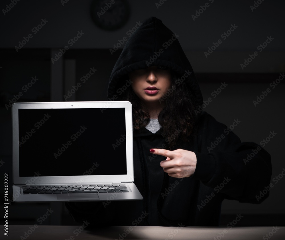 Poster female hacker hacking security firewall late in office