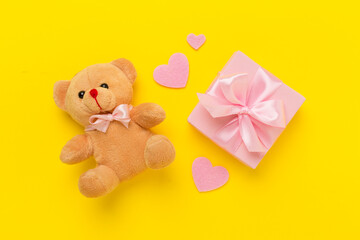 Valentines day composition with gifts on color background, top view.