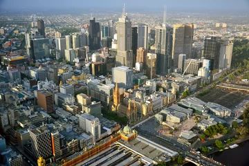 Tuinposter View over downtown Melbourne, Australia. View with modern and historic buildings. © Alizada Studios