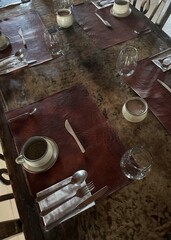 Overhead view of a table top with several place settings