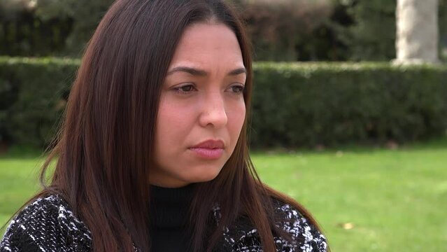 Cuban Girl's Solitude in Park: A Sad Gaze