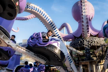 Foto op Plexiglas Latin man having fun at an amusement park © Mariano