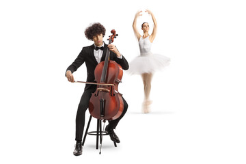 Young male cellist sitting on a chair and performing and ballet dancer performing © Ljupco Smokovski