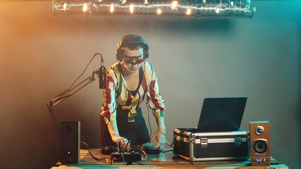 Woman performer suffering from migraine and pain, feeling unwell and frustrated before mixing...