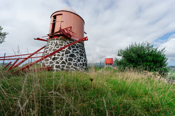 Traditional red and white windmill on Faial Island, Azores