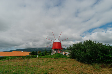 Traditional red and white windmill on Faial Island, Azores