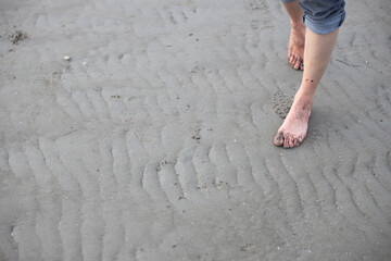Benefit of Barefoot Walking Outdoors - Caucasian Female Walking on a Beach