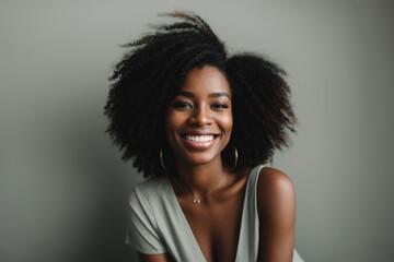 African American woman with a beautiful smile and perfect white teeth. Closeup portrait.
