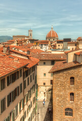 Fototapeta na wymiar Italian Terracotta Rooftops of Sunny Florence with Duomo, Italy