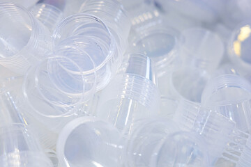 Mass production of packaging. Transparent plastic containers with a lid for food packaging. Food...