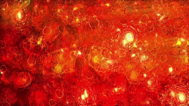 Liquid motion of bright shiny molecules in orange substance.