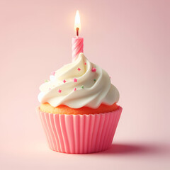 birthday cupcake with candle on pink background