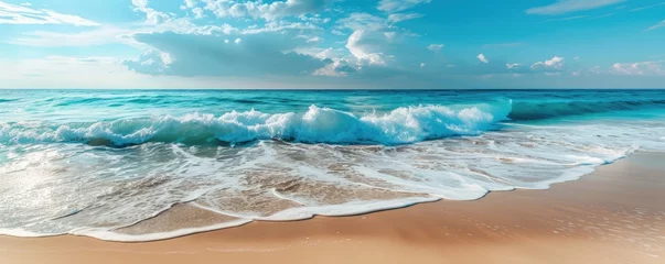 Foto op Aluminium Calm beach landscape with golden sand, tranquil waves and a blue sky © piai