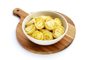 Banana slices on white background.