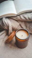 Burning candle in a cozy home interior