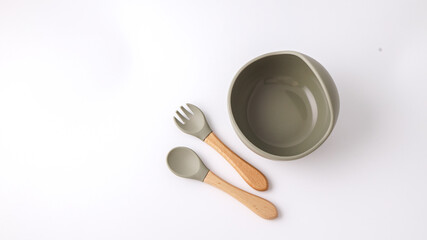 Set of silicone dishware for baby. First baby food concept, serving food for kids